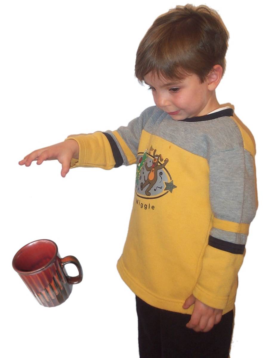 Boy dropping mug.jpg